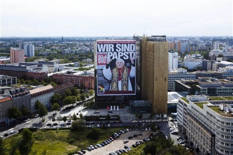 Germany's tabloid Bild Zeitung has covered its building with a giant reprint of their front page from April 20, 2005 when Pope Benedict XVI was elected and the headline 'We Are Pope' in Berlin, on Monday. The large poster will welcome the pope to Germany, when he visits from Thursday Sept. 22 until Sunday Sept. 25.